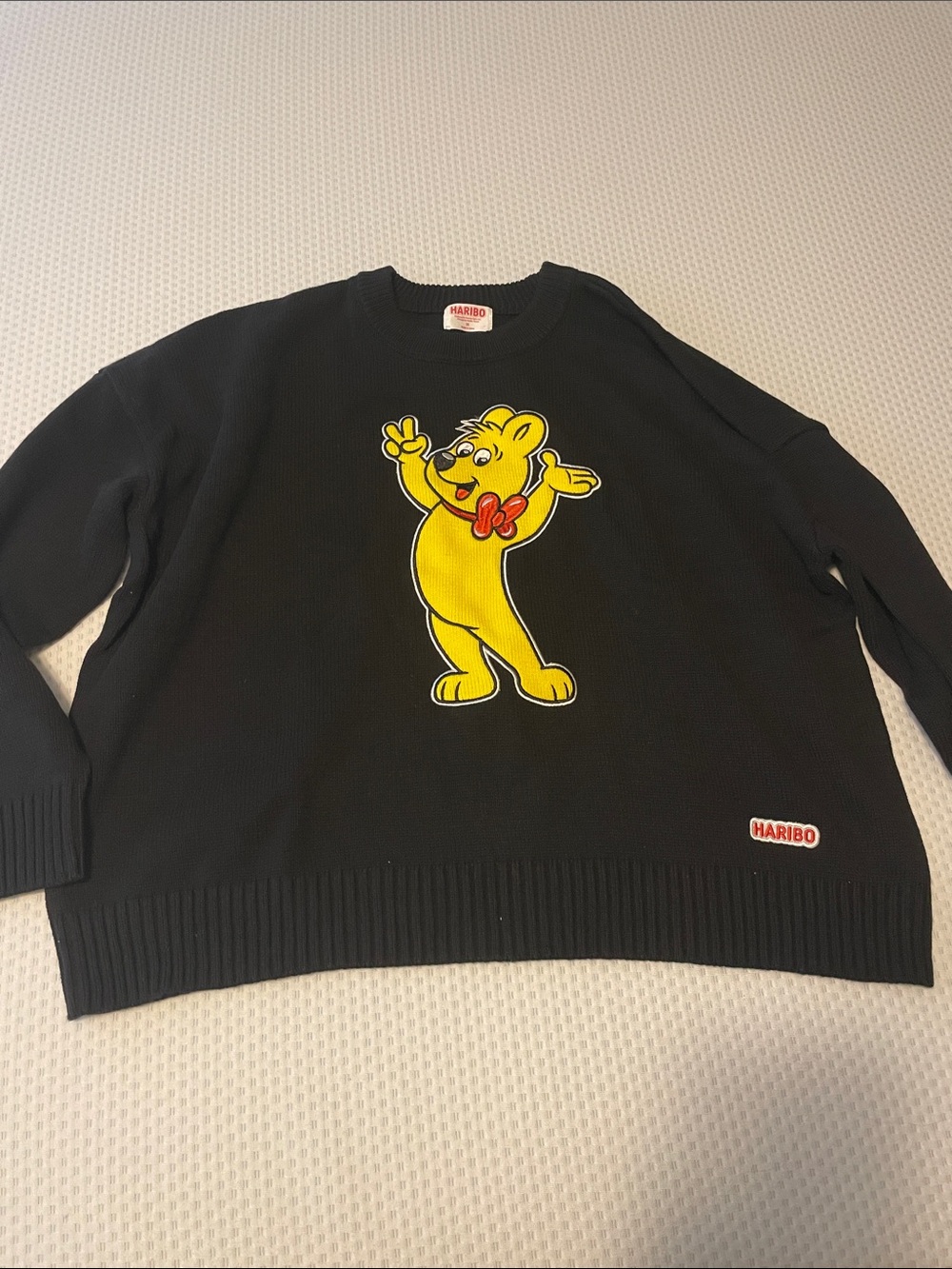 HARIBO Black Crewneck Sweater with Yellow Bear and Red Bow